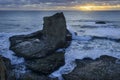 Sunset and sea-stack at Seven-Mile Beach, near Santa Cruz California, USA Royalty Free Stock Photo