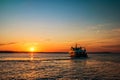 Sunset with ship sailing to the Brijuni Islands in Fazana, Croatia Royalty Free Stock Photo