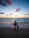 Sunset on the shore with objects for the rescue of bathers Royalty Free Stock Photo