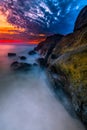 Sunset shot from the edge of a large rock Royalty Free Stock Photo