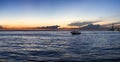 Sunset and silhouette on boat cruising the Amazon River, Brazil