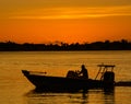 Sunset with the silhouette of a boat on the inter coastal in Belleair Bluffs, FloridaSunset with the silhouette of a boat on the i Royalty Free Stock Photo