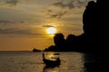 Sunset silhouette of boat in sea Railey bay in Thailand Royalty Free Stock Photo