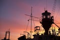 Sunset silhouette of a lighthouse ship