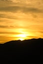 Sunset in silhouette mountains