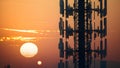 Sunset Silhouette of a Tech-Adorned Tower. Concept Tech, Sunset, Silhouette, Tower Royalty Free Stock Photo