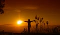 Sunset silhouette Young woman feeling to Freedom and Relax Royalty Free Stock Photo