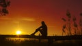 Sunset silhouette Young woman sad