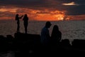 Sunset Silhouettes on the Beach Royalty Free Stock Photo