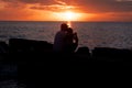 Sunset Silhouettes on the Beach Royalty Free Stock Photo