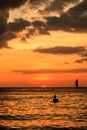 Sunset and silhouettes on a tropical ocean