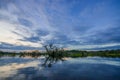 Sunset silhouetting a flooded jungle in Laguna Grande, in the Cuyabeno Wildlife Reserve, Amazon Basin, Ecuador Royalty Free Stock Photo