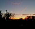 Sunset siluette trees clouds blue yellow ornge sky