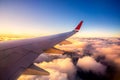 Sunset sky on airplane, plane window seat over Paris, France, Europe for travel and business trip in weekend holiday and beauty Royalty Free Stock Photo