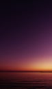 Sunset Sky Background,Beautiful Nature Landscape Summer Sun dawn in Purple,Orange,Pink,Yellow,Twilight sky in the Evening by Sea Royalty Free Stock Photo
