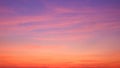Sunset sky background with beautiful pink sunset clouds on colorful romantic evening twilight sky Royalty Free Stock Photo