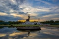 Sunset sky and Buddha statue at PhutthamonthonBuddhist park in Nakhon Pathom Province of Thailand