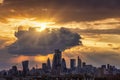 Sunset sky with clouds and sunrays over the urban skyline of the City of London Royalty Free Stock Photo