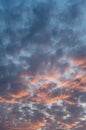 Sunset sky with clouds vertical background. Clouds on a hot summer day Royalty Free Stock Photo