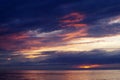 Sea sunset with lighted clouds Royalty Free Stock Photo