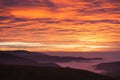 Sunset sky and foggy valley in black forest, Germany