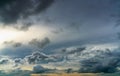 Sunset sky and gray and golden clouds. Gray sky and fluffy clouds. Thunder and storm sky. Sad and moody sky. Dead abstract