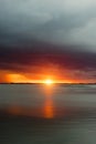 Sunset sky at the lake under rain cloud Royalty Free Stock Photo