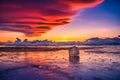 Sunset sky with natural breaking ice over frozen water on Lake Baikal, Siberia, Russia Royalty Free Stock Photo