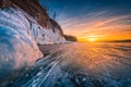 Sunset sky with natural breaking ice over frozen water on Lake Baikal, Siberia, Russia Royalty Free Stock Photo