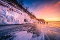 Sunset sky with natural breaking ice over frozen water on Lake Baikal, Siberia, Russia Royalty Free Stock Photo