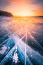 Sunset sky with natural breaking ice over frozen water on Lake Baikal, Siberia, Russia Royalty Free Stock Photo