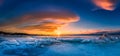 Sunset sky with natural breaking ice over frozen water on Lake Baikal, Siberia, Russia Royalty Free Stock Photo