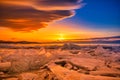 Sunset sky with natural breaking ice over frozen water on Lake Baikal, Siberia, Russia Royalty Free Stock Photo