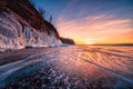 Sunset sky with natural breaking ice over frozen water on Lake Baikal, Siberia, Russia Royalty Free Stock Photo