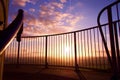 Sunset behind balcony railings