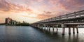 Sunset sky over bridge over Hickory Pass leading to the ocean in Bonita Springs