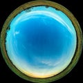 Sunset and sky over the meadow. Circular fisheye view of a landscape in the countryside