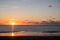 Sunset sky over sea in the evening with colorful clouds orange sunlight Royalty Free Stock Photo