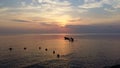 Sunset sky over the sea in the evening with colorful sunlight in the summer season, majestic sky. Horse walk in the water silhouet Royalty Free Stock Photo