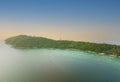 Sunset sky scene with coral reef in Thailand with Tropical island with white sand beach and blue clear water and granite stones-