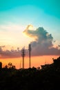 Sunset sky with silhouette antenna