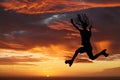 Sunset sky, silhouette and roller skates woman jumping against an orange horizon while enjoying freedom, travel and fun Royalty Free Stock Photo