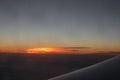 Sunset sky stratosphere background. Beautiful aerial view above clouds with sunset. Airplane view.beautiful sunset view from the p Royalty Free Stock Photo