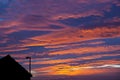 Sunset sky with streetlight and rooftop Royalty Free Stock Photo