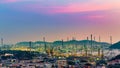 Sunset sky tone over oil refinery in residence downtown Royalty Free Stock Photo