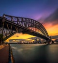 Sunset skyline of Sydney downtown with city lights and Harbour Bridge Royalty Free Stock Photo