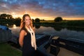 Sunset sloop woman Royalty Free Stock Photo
