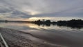 sunset from a small boat on the Kampar River Royalty Free Stock Photo