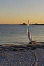 Sailing boat on the beach at sunset in Brittany, France Royalty Free Stock Photo