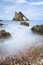 Sunset with smooth water at bow fiddle rock Royalty Free Stock Photo